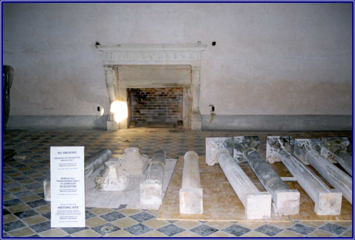 The original Stone House columns resting within the Stone House ballroom after Hurricane Andrew