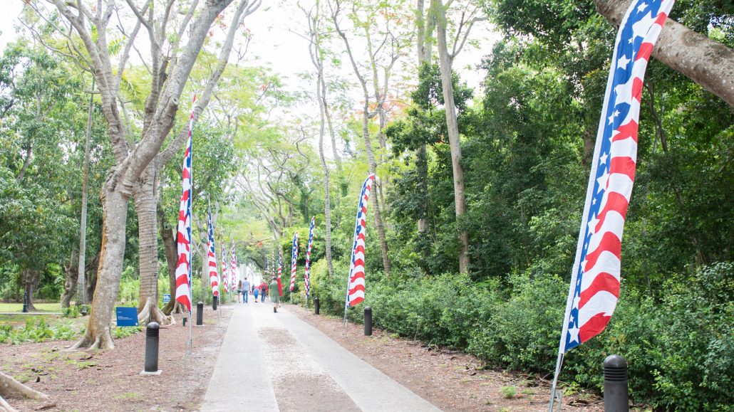 Main pathway of Deering Estate decorated for Memorial Day