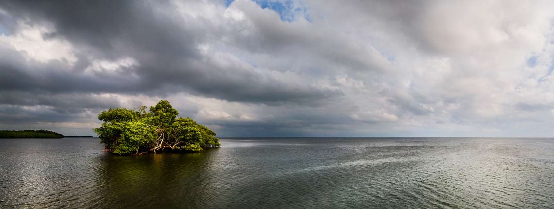 Stormy clouds over the open water by the boat basin of Deering Estate