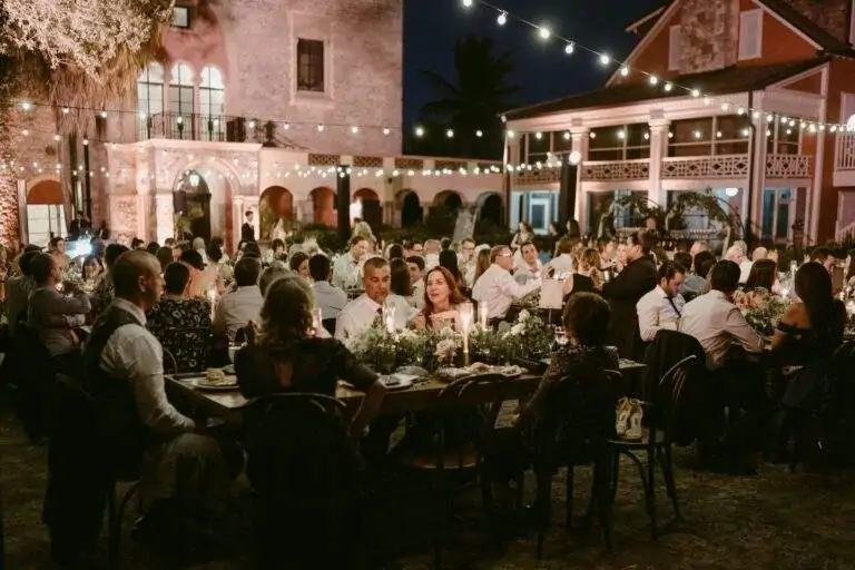 Loved ones gathered together seated at a wedding reception.