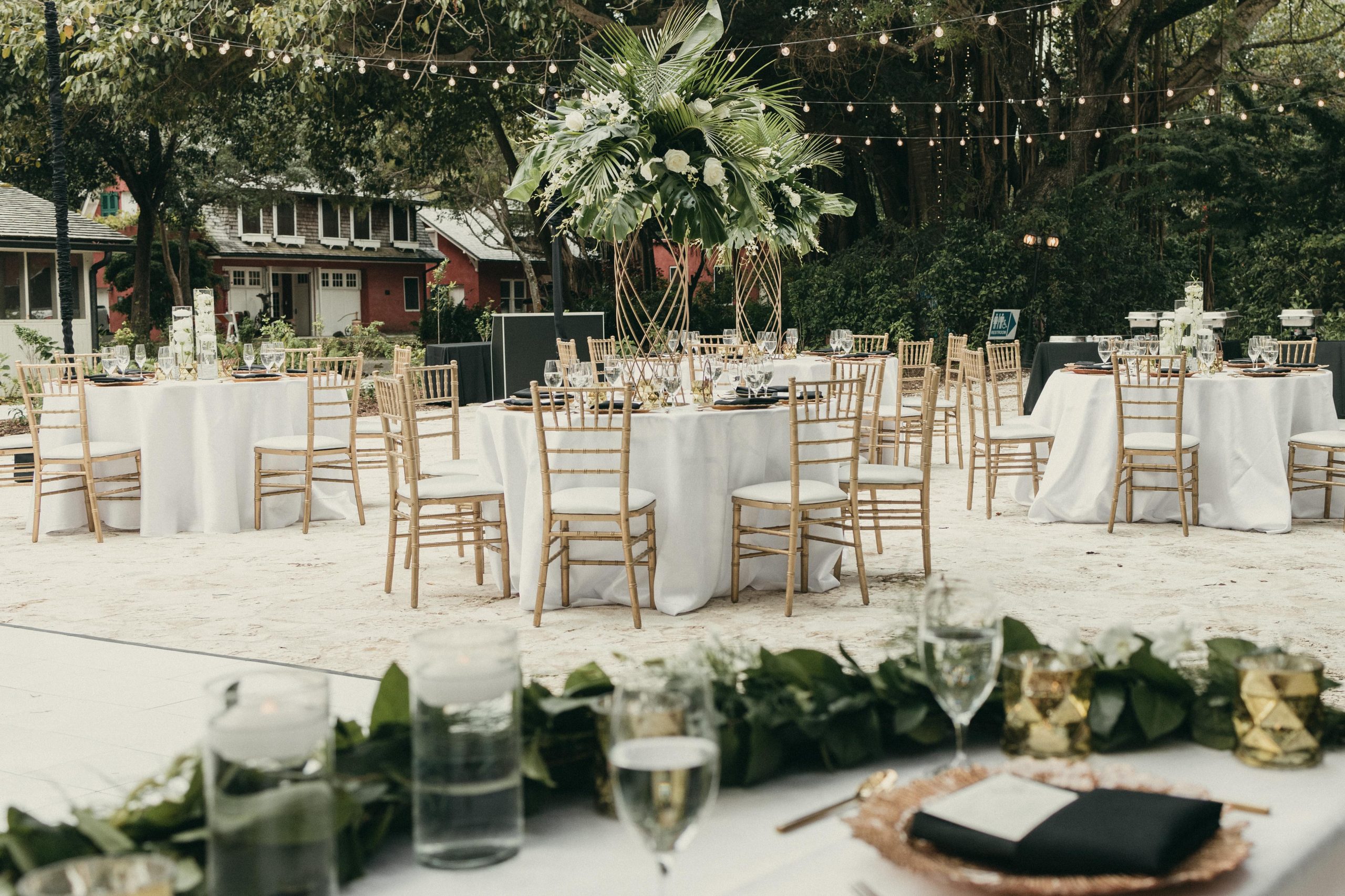 Photo taken from the grooms' sweetheart's table overlooking the wedding reception set-up at Deering Estate's historic Courtyard