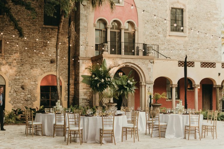 View of the Courtyard wedding reception. The Stone House museum is in the background.