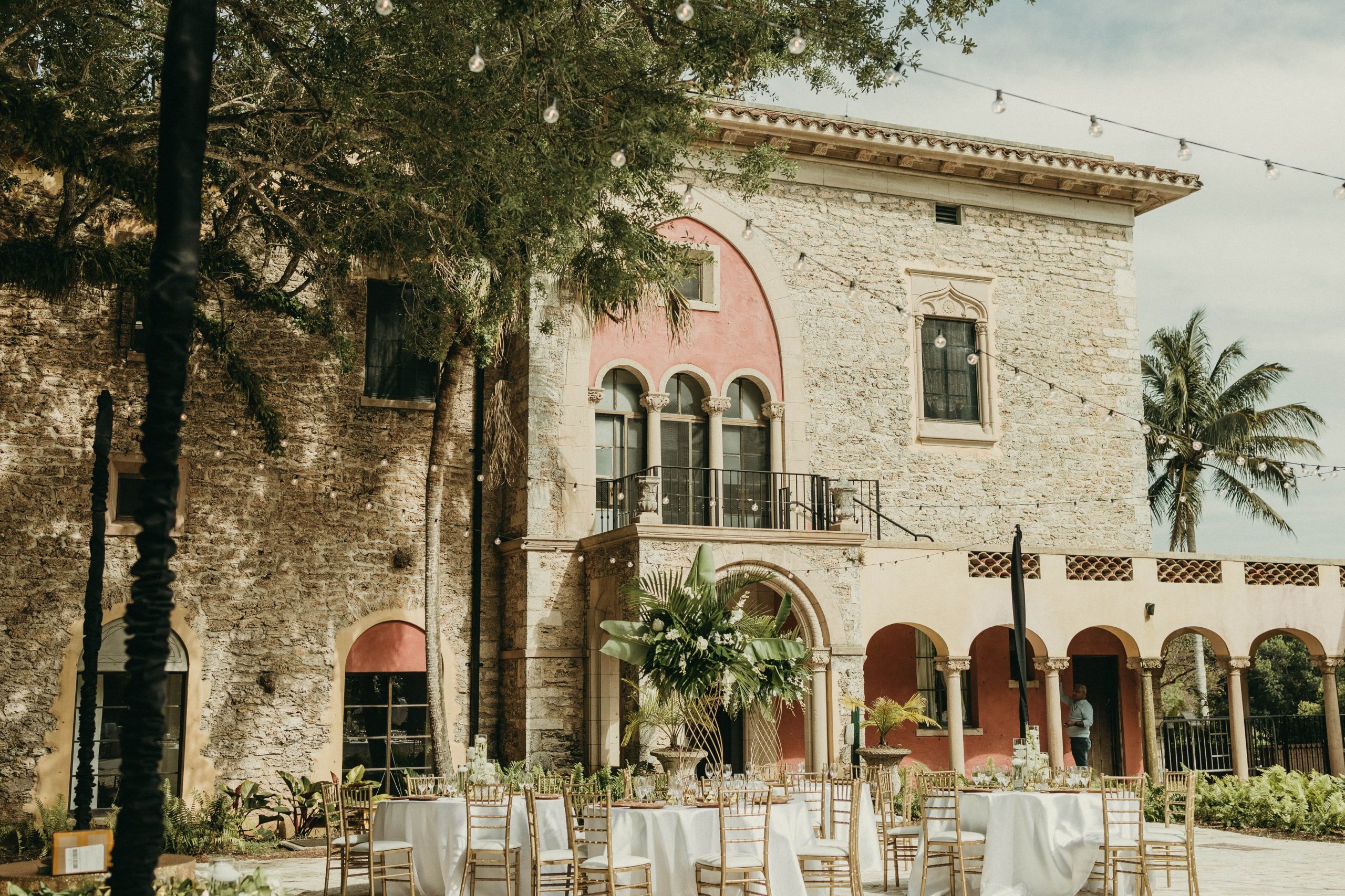 View of the Courtyard wedding reception. The Stone House museum is in the background.