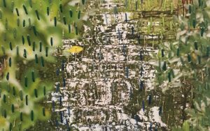 A photo of mangroves and water with embroidery of running stitches over it. This is a piece by Pangea Kali Virga.