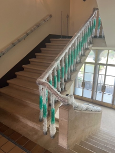 Stone House stair banisters protected with bubblewrap.