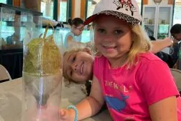 Kids learning how to filter water on their interactive field trip.